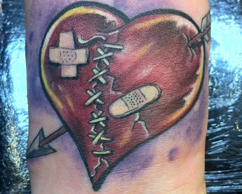A broken heart can be mended tattoo