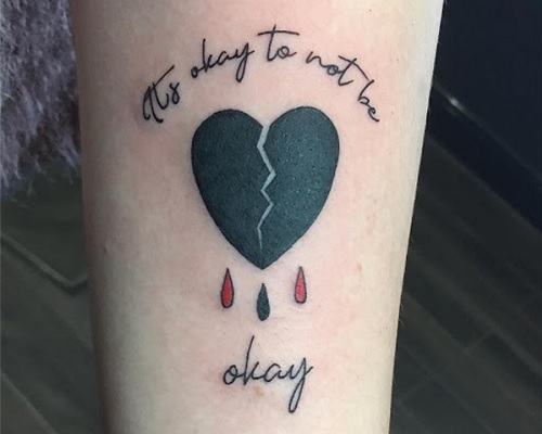 A broken heart tattoo signifies loss