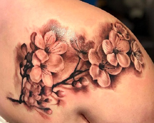 Black and gray cherry blossom tattoo