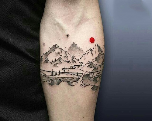 Black and grey mountain tattoo