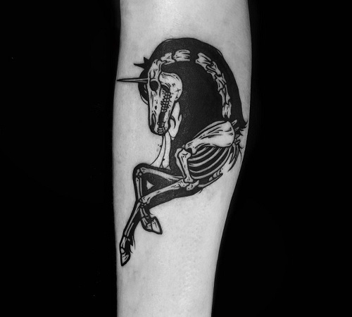Black unicorn tattoo