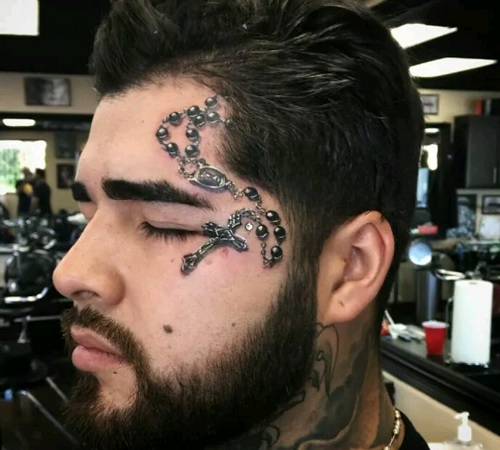 Cross Face Tattoo