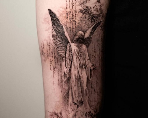 Descending angel tattoo