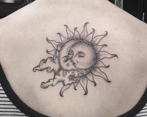 Eclipse sun and moon tattoo