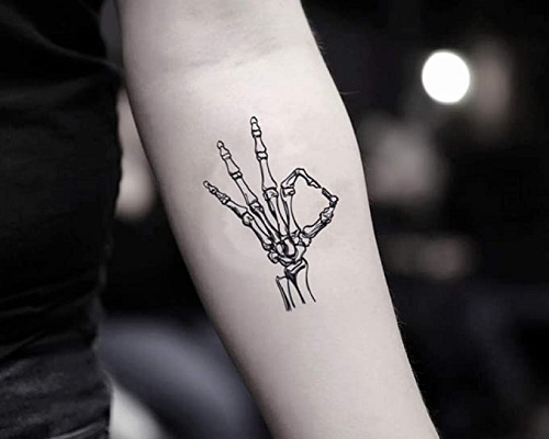 Expressive Hand Tattoo