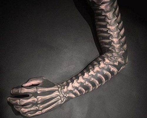 Full-Arm Skeletal Hand Tattoo