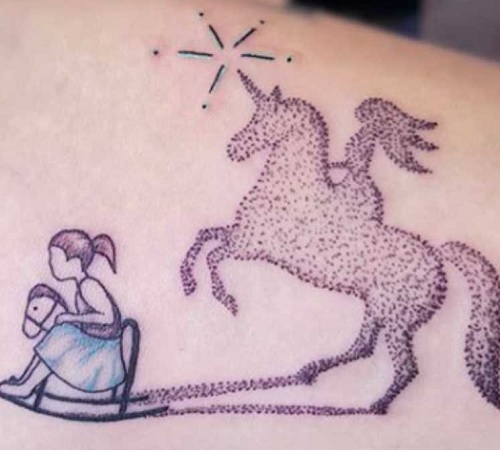 Hand-poked unicorn tattoo