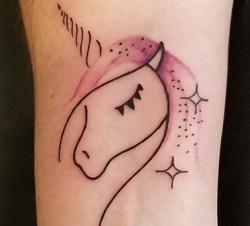 Minimalist unicorn tattoo