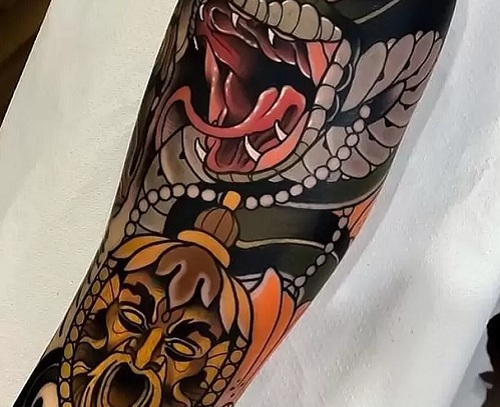 Neo-Traditional snake tattoo