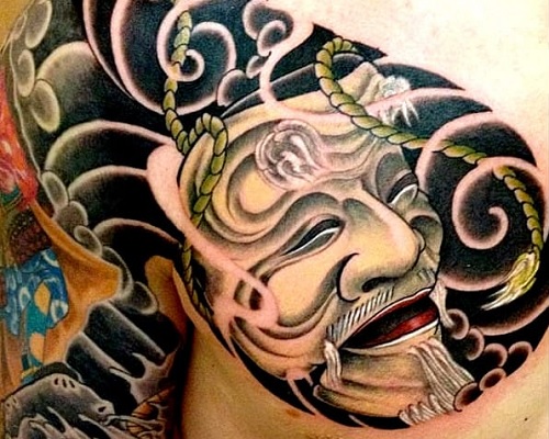 Okina Mask tattoo