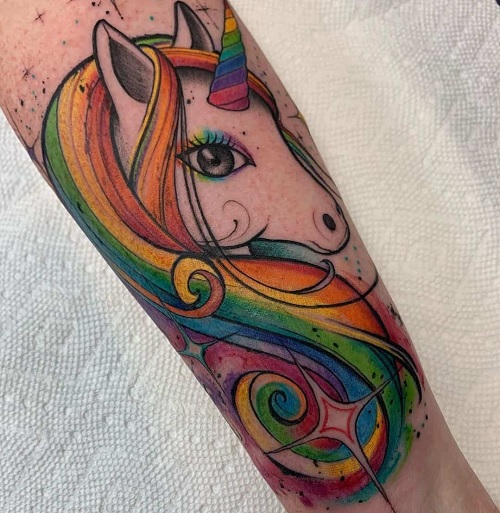 Rainbow-colored unicorn tattoo
