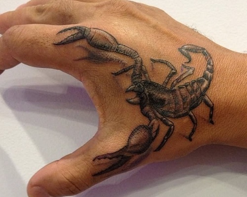 Scorpion tattoo on a hand