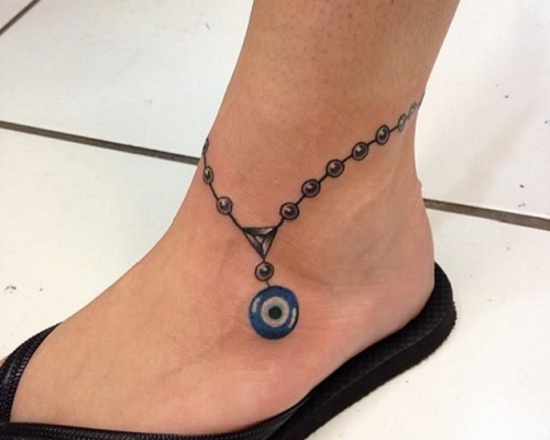 Turkish evil eye tattoo on the foot