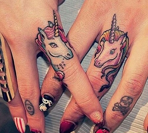 Unicorn tattoo on a finger