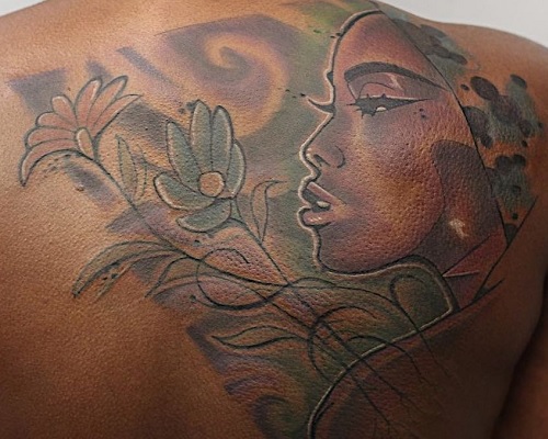 Watercolor tattoo on dark skin