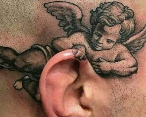 Whispering angel tattoo